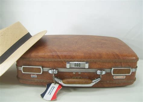 American tourister escort briefcase  Description: Vintage Genuine Leather 1960’s Briefcase, fully lined